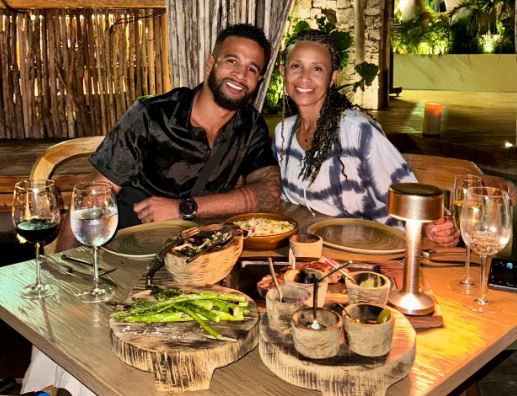 Nelson Thomas with his mother