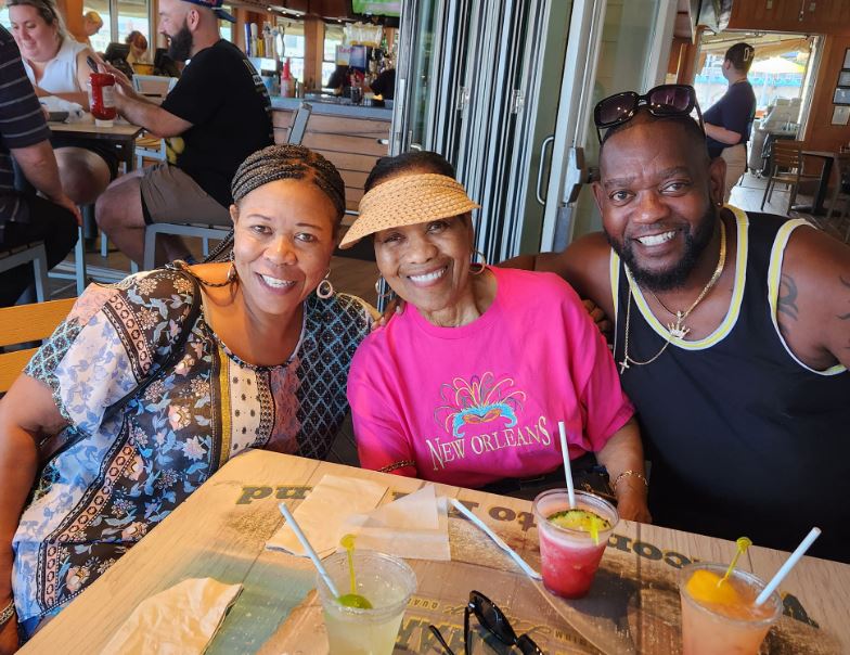 Vernest Moore with his mother and sister
