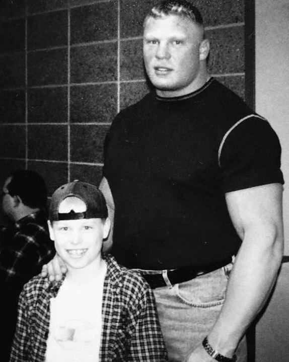 Childhood photo of Luke with his dad Brock lesner