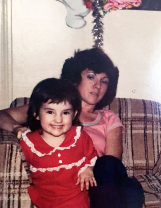 Childhood photo of Nicole with her mother