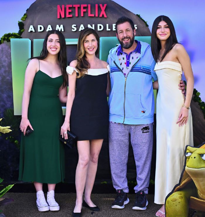 Jackie Sandler with her husband and daughters
