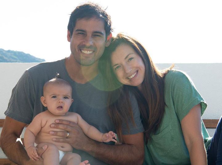 John Fincher with his wife and child