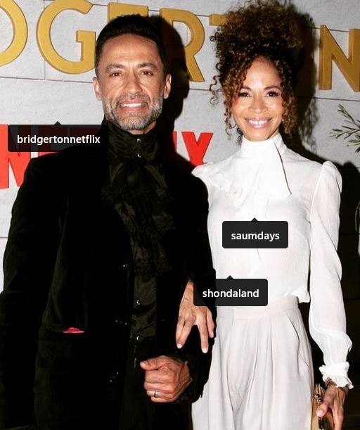 Kamar De Los Reyes with his wife