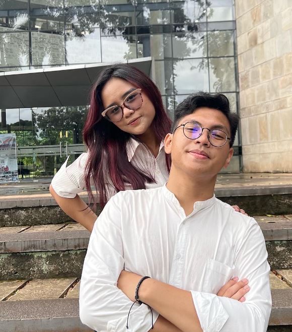 Melki Sedek Huang with girlfriend