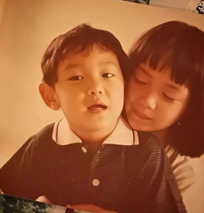 Young Sara with her brorther