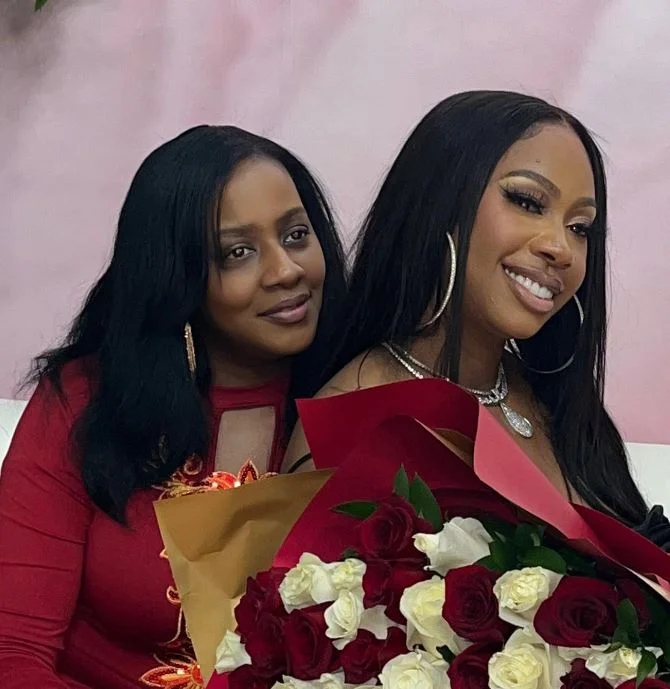 Aisha Hall with her mother