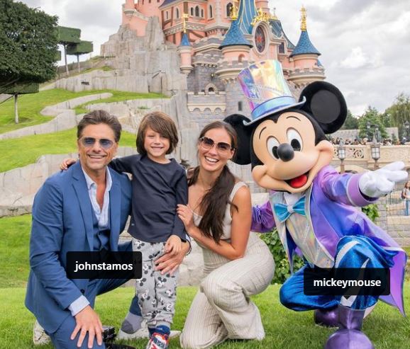 Caitlin McHugh with her husband and kid