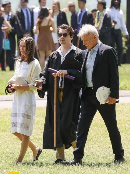 Liam Flockhart with his parents