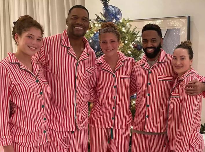 Michael Strahan Jr with his sister's and father