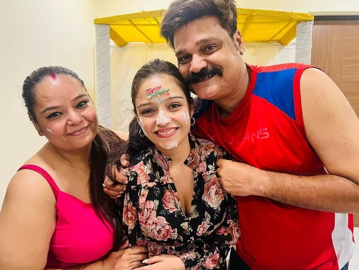 Trupti Mishra with her parents