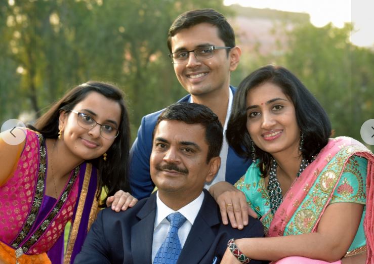 sandeep poundrik with his wife and kids