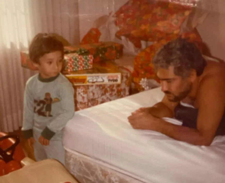 Childhood photo of Michael Corleone with his dad