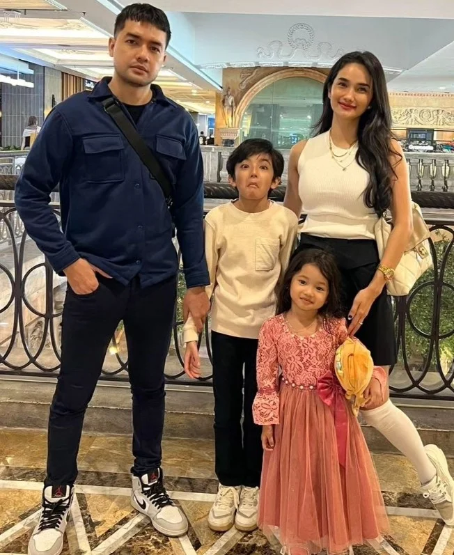 Faby Marcelia with her kids and husband