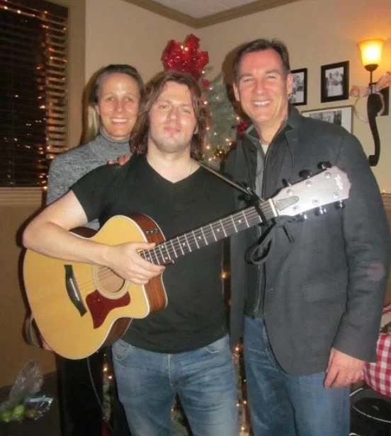 Helene Suozzi with her husband and Joe Taylor