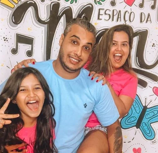 Marianna Santos with her parents