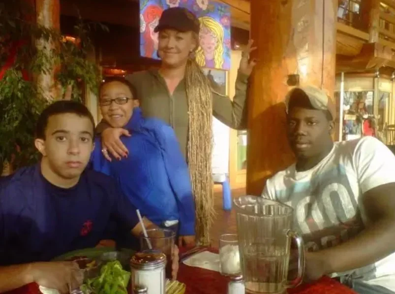 Rachel Dolezal with her son Franklin Moore and brothers Ezra Dolezal and Zach Dolezal