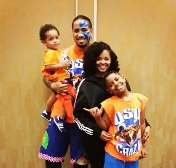 Takecia Travis with her husband and kids