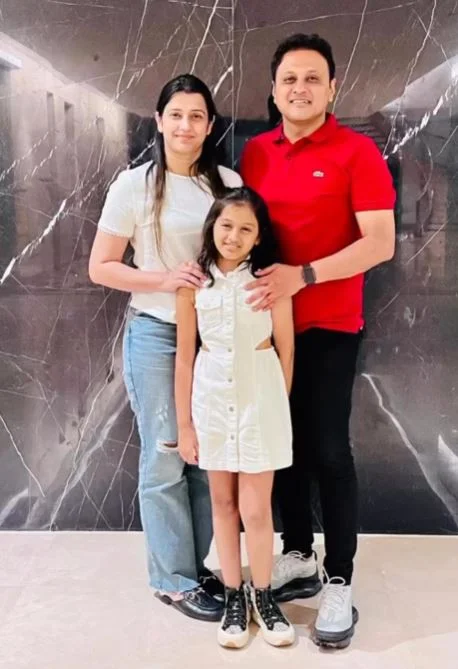 Tejasvee Darekar with her husband and daughter