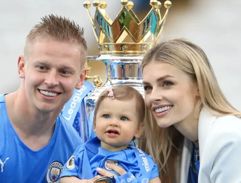 Vlada Zinchenko with her husband & child