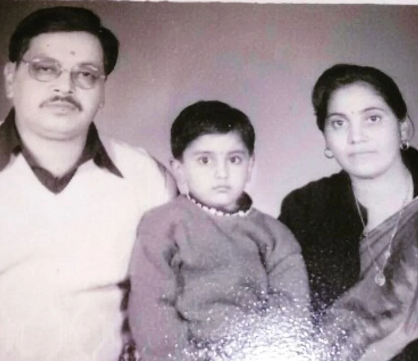 Young Shruti Anand with her parents