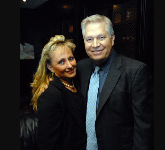 Chris Mortensen with his wife