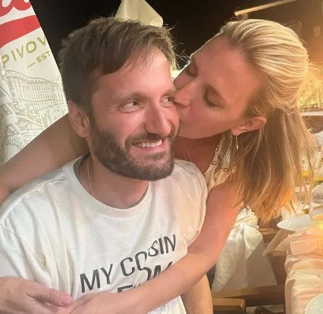 Poppy Harlow with her husband